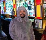 Bartender Dressed in Fuzzy Dog Costume
