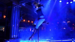 Mica shows how fast she can spin on the pole.  